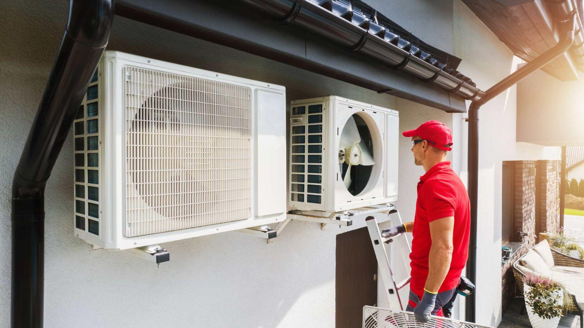 An HVAC technician conducts a scheduled maintenance on an HVAC unit for a Las Vegas home.